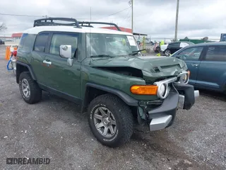 2014 Toyota FJ Cruiser with VIN JTEBU4BF1EK203587, listed as a IAAI auction lot 41978010 with 62,438 mi miles. Bid and sale history available at carsss.com. Image 1.