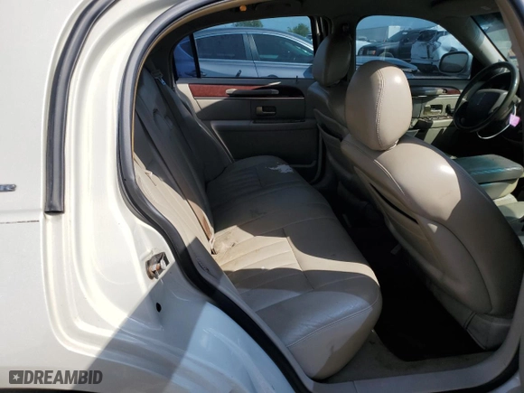 2005 Lincoln Town Car Signature with VIN 1LNHM81W95Y629785, listed as a Copart auction lot 53444095 with 150,120 mi miles and Salvage Title. Bid and sale history available at carsss.com. Image 10.