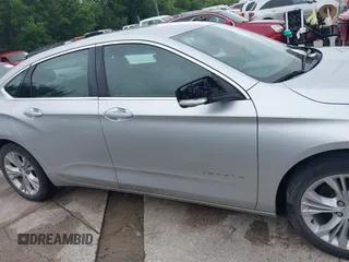 2014 Chevrolet Impala LT with VIN 2G1125S33E9103583, listed as a IAAI auction lot 42125293 with 143,951 mi miles and . Bid and sale history available at DreamBid. Image 13.