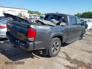 2017 Toyota Tacoma SR5 with VIN 3TMDZ5BN8HM030014, listed as a IAAI auction lot 42044102 with Not provided miles and . Bid and sale history available at DreamBid. Image 4.