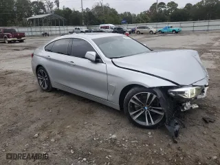 2020 BMW 4 Series 430i with VIN WBA4J1C04LBU68304, listed as a Copart auction lot 79492154 with NaN miles and Salvage Title. Bid and sale history available at carsss.com. Image 4.