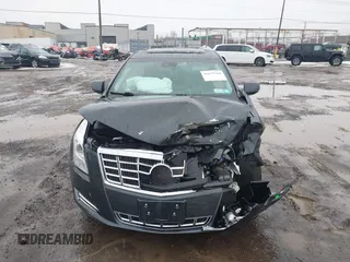 2013 Cadillac XTS Luxury z VIN 2G61R5S35D9100771, wystawiony jako IAAI lot #41673766 z przebiegiem 41 123 mil mil oraz . Historia ofert i sprzedaży dostępna na DreamBid. Obrazek 12.