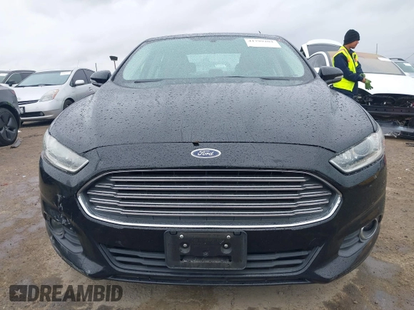 2016 Ford Fusion SE Hybrid with VIN 3FA6P0LU5GR356433, listed as a IAAI auction lot 41799204 with 157,670 mi miles. Bid and sale history available at carsss.com. Image 12.