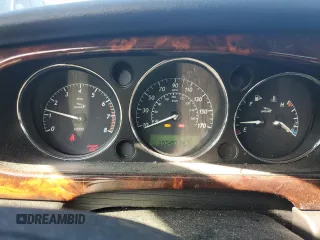 2004 Jaguar XJ with VIN SAJEA71C04SG04022, listed as a Copart auction lot 45875105 with 153,453 mi miles and Salvage Title. Bid and sale history available at carsss.com. Image 9.