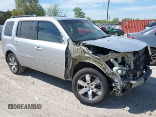 2013 Honda Pilot Touring z VIN 5FNYF4H94DB052797, wystawiony jako IAAI lot #42199800 z przebiegiem 165 470 mil mil oraz . Historia ofert i sprzedaży dostępna na DreamBid. Obrazek 1.