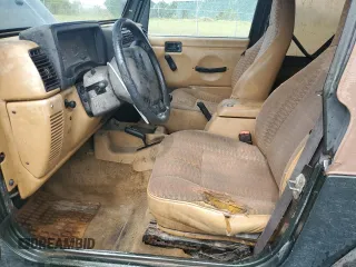 1998 Jeep Wrangler Sport with VIN 1J4FY19S5WP795781, listed as a Copart auction lot 59718065 with 208,416 mi miles and Salvage title. Bid and sale history available at DreamBid. Image 7.