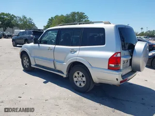 2003 Mitsubishi Montero LTD with VIN JA4NW51S53J030850, listed as a IAAI auction lot 42063733 with 210,810 mi miles. Bid and sale history available at carsss.com. Image 3.