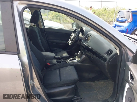 2014 Mazda CX-5 Sport with VIN JM3KE2BE9E0423737, listed as a IAAI auction lot 42222646 with 116,160 mi miles and . Bid and sale history available at DreamBid. Image 5.