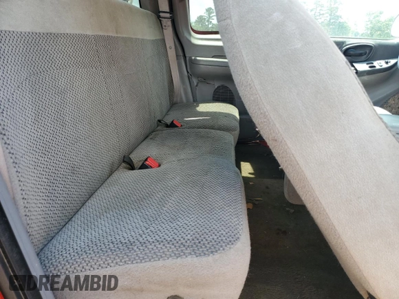 1999 Ford F-150 XL z VIN 1FTRX18L8XKC14644, wystawiony jako Copart lot #53959095 z przebiegiem Nie podano mil oraz Szkoda całkowita • Salvage title. Historia ofert i sprzedaży dostępna na DreamBid. Obrazek 10.