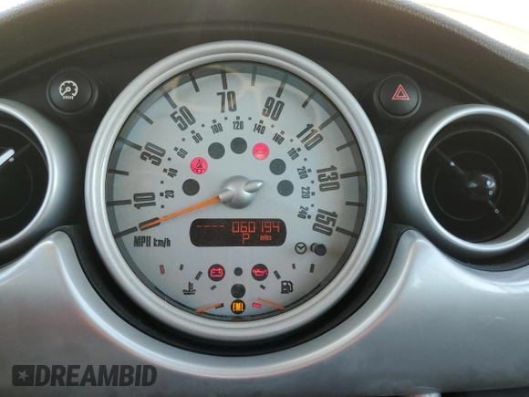 2006 MINI Hardtop with VIN WMWRC33556TJ75369, listed as a Copart auction lot 61793745 with 60,194 mi miles and Clean title. Bid and sale history available at DreamBid. Image 9.