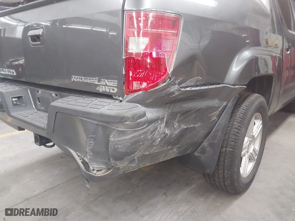 2011 Honda Ridgeline RTL with VIN 5FPYK1F57BB004189, listed as a IAAI auction lot 41871741 with 193,913 mi miles. Bid and sale history available at carsss.com. Image 6.