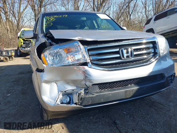 2012 Honda Pilot EX-L with VIN 5FNYF4H52CB029322, listed as a IAAI auction lot 41886279 with 156,436 mi miles and . Bid and sale history available at DreamBid. Image 6.