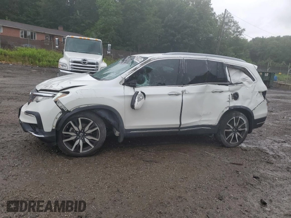 2021 Honda Pilot Touring 7-Passenger z VIN 5FNYF6H64MB004962, wystawiony jako Copart lot #57860225 z przebiegiem 52 311 mil mil oraz Szkoda całkowita • Salvage title. Historia ofert i sprzedaży dostępna na DreamBid. Obrazek 1.
