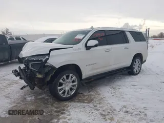 2022 Chevrolet Suburban High Country with VIN 1GNSKGKLXNR151036, listed as a IAAI auction lot 41549439 with 97,613 mi miles and . Bid and sale history available at DreamBid. Image 19.