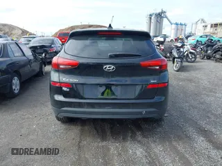 2019 Hyundai Tucson SE with VIN KM8J2CA46KU977863, listed as a IAAI auction lot 41704318 with 23,076 mi miles. Bid and sale history available at carsss.com. Image 16.