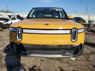 2023 Rivian R1S Adventure z VIN 7PDSGABA1PN009442, wystawiony jako Copart lot #45375605 z przebiegiem 28 047 mil mil oraz Szkody całkowita. Historia ofert i sprzedaży dostępna na DreamBid. Obrazek 5.