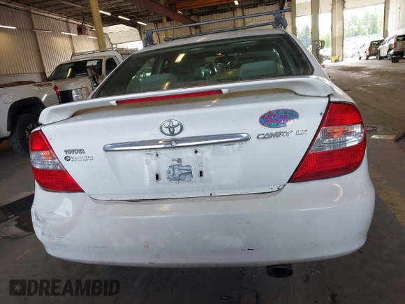 2004 Toyota Camry LE with VIN JTDBE32K540257588, listed as a IAAI auction lot 42208098 with 201,770 mi miles and . Bid and sale history available at DreamBid. Image 16.