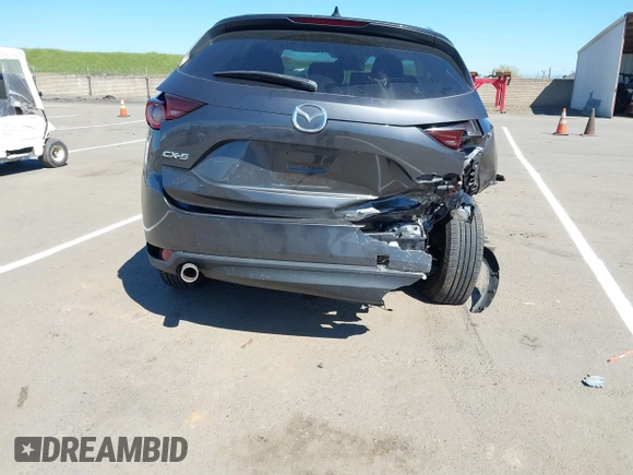 2019 Mazda CX-5 Touring with VIN JM3KFACM1K0533142, listed as a IAAI auction lot 41880181 with Not Provided miles and . Bid and sale history available at carsss.com. Image 16.
