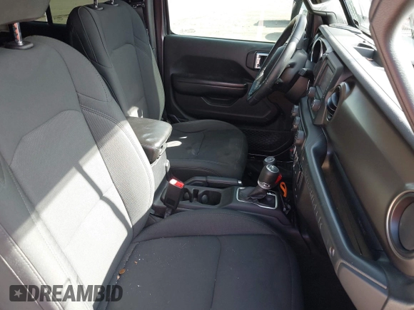 2019 Jeep Wrangler Unlimited Sport S with VIN 1C4HJXDG0KW541940, listed as a IAAI auction lot 42100255 with 68,309 mi miles and . Bid and sale history available at DreamBid. Image 5.