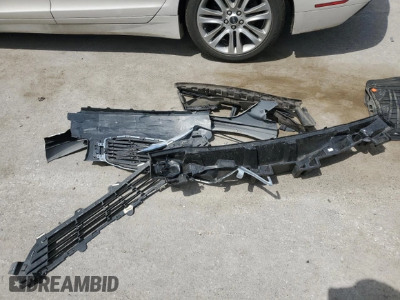 2014 Lincoln MKZ Hybrid z VIN 3LN6L2LU2ER816576, wystawiony jako Copart lot #57030235 z przebiegiem 221 863 mil mil oraz Szkoda całkowita • Salvage title. Historia ofert i sprzedaży dostępna na DreamBid. Obrazek 12.