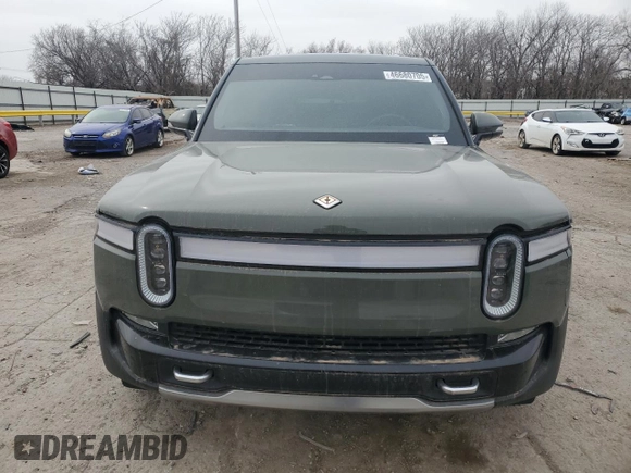 2022 Rivian R1T Launch Edition z VIN 7FCTGAAL2NN000433, wystawiony jako Copart lot #46680705 z przebiegiem Nie podano mil oraz Szkody całkowita. Historia ofert i sprzedaży dostępna na DreamBid. Obrazek 5.