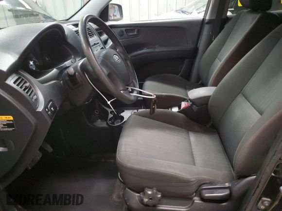 2009 Kia Sportage LX with VIN KNDJF724597564338, listed as a Copart auction lot 44123195 with 113,132 mi miles and Salvage Title. Bid and sale history available at carsss.com. Image 7.