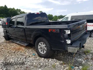 2020 Ford F-250 XL with VIN 1FT8W2BTXLEE30615, listed as a Copart auction lot 60626295 with 142,318 mi miles and Salvage title. Bid and sale history available at DreamBid. Image 2.