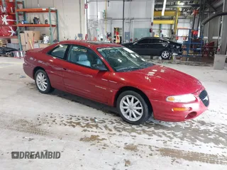 1998 Chrysler Sebring LXi z VIN 4C3AU52N8WE020977, wystawiony jako IAAI lot #42527982 z przebiegiem 66 518 mil mil oraz . Historia ofert i sprzedaży dostępna na DreamBid. Obrazek 1.