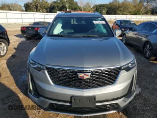 2023 Cadillac XT6 FWD Luxury z VIN 1GYKPAR48PZ115719, wystawiony jako Copart lot #87848435 z przebiegiem 17 597 mil mil oraz Szkoda całkowita • Salvage title. Historia ofert i sprzedaży dostępna na DreamBid. Obrazek 5.