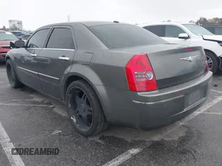 2010 Chrysler 300 Touring with VIN 2C3CA5CV2AH125842, listed as a IAAI auction lot 41804591 with 241,216 mi miles. Bid and sale history available at carsss.com. Image 3.