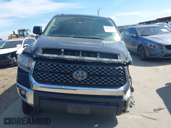 2018 Toyota Tundra SR5 z VIN 5TFDW5F12JX694518, wystawiony jako IAAI lot #41663831 z przebiegiem 183 220 mil mil oraz . Historia ofert i sprzedaży dostępna na DreamBid. Obrazek 13.