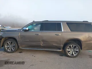 2016 Chevrolet Suburban LTZ with VIN 1GNSCJKC0GR173690, listed as a IAAI auction lot 41780251 with 125,603 mi miles and . Bid and sale history available at DreamBid. Image 14.