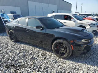 2019 Dodge Charger SXT with VIN 2C3CDXBG1KH697184, listed as a Copart auction lot 54313085 with 108,518 mi miles and Clean Title. Bid and sale history available at carsss.com. Image 4.