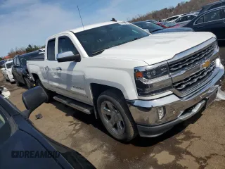 2017 Chevrolet Silverado 1500 LTZ with VIN 1GCVKSECXHZ305981, listed as a Copart auction lot 51273425 with 77,465 mi miles and Salvage Title. Bid and sale history available at DreamBid. Image 4.