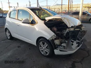 2013 Chevrolet Spark LS with VIN KL8CB6S92DC606581, listed as a IAAI auction lot 41333542 with 72,733 mi miles. Bid and sale history available at carsss.com. Image 1.