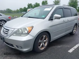 2009 Honda Odyssey Touring with VIN 5FNRL38859B029714, listed as a IAAI auction lot 42266381 with 196,747 mi miles and . Bid and sale history available at DreamBid. Image 2.