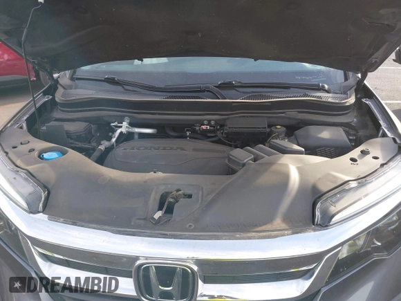 2021 Honda Pilot EX-L with VIN 5FNYF5H54MB018846, listed as a IAAI auction lot 41208987 with 80,757 mi miles and . Bid and sale history available at DreamBid. Image 10.