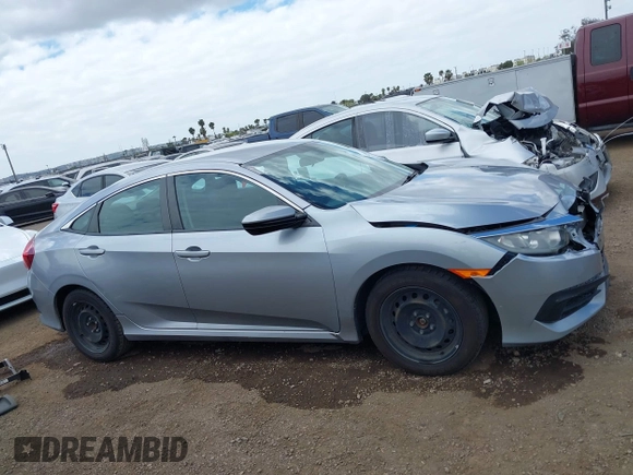 2018 Honda Civic LX with VIN 2HGFC2F50JH500559, listed as a IAAI auction lot 42040271 with 82,026 mi miles and . Bid and sale history available at DreamBid. Image 13.