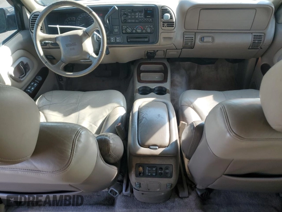 1999 GMC Denali with VIN 1GKEK13R1XR912632, listed as a Copart auction lot 51223085 with 223,201 mi miles and Salvage Title. Bid and sale history available at carsss.com. Image 8.