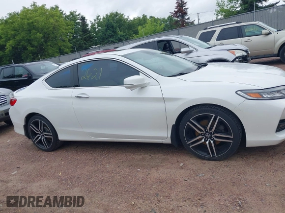 2016 Honda Accord Touring with VIN 1HGCT2B09GA007614, listed as a IAAI auction lot 42532621 with 200,935 mi miles and . Bid and sale history available at DreamBid. Image 13.