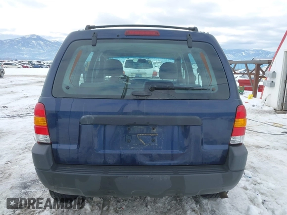 2003 Ford Escape XLS Popular with VIN 1FMYU92153KE01890, listed as a IAAI auction lot 41605087 with 109,411 mi miles. Bid and sale history available at carsss.com. Image 17.