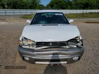 1999 Subaru Legacy Outback with VIN 4S3BG6850X7649578, listed as a Copart auction lot 56654155 with 174,651 mi miles and Salvage title. Bid and sale history available at DreamBid. Image 5.