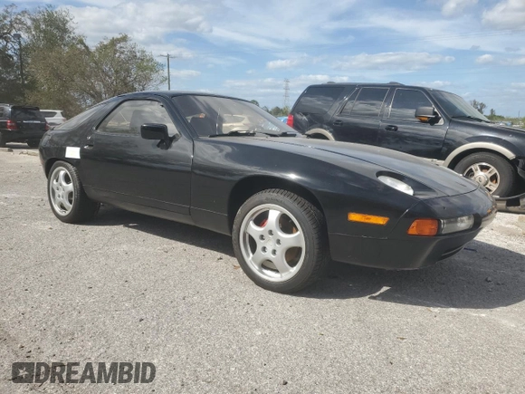 1980 Porsche 928 z VIN 92A0810156, wystawiony jako Copart lot #76952224 z przebiegiem 91 484 mil mil oraz Szkoda całkowita • Salvage title. Historia ofert i sprzedaży dostępna na DreamBid. Obrazek 4.