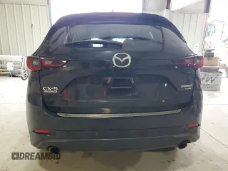 2023 Mazda CX-5 Signature with VIN JM3KFBXY6P0235017, listed as a Copart auction lot 45979615 with 14,487 mi miles and Salvage Title. Bid and sale history available at carsss.com. Image 6.