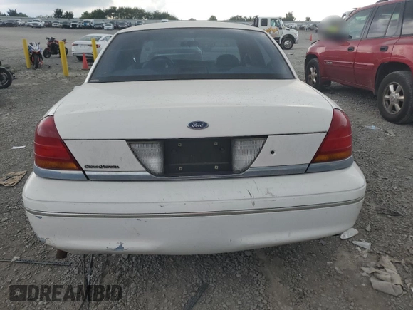 1998 Ford Crown Victoria Police z VIN 2FAFP71W7WX124185, wystawiony jako Copart lot #66187024 z przebiegiem 161 325 mil mil oraz Szkody całkowita. Historia ofert i sprzedaży dostępna na DreamBid. Obrazek 6.