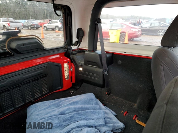 2020 Jeep Wrangler Willys z VIN 1C4GJXAG8LW180801, wystawiony jako Copart lot #87551435 z przebiegiem 71 216 mil mil oraz Szkoda całkowita • Salvage title. Historia ofert i sprzedaży dostępna na DreamBid. Obrazek 10.