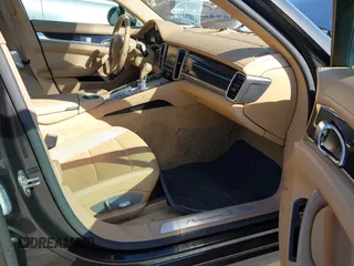 2014 Porsche Panamera S E-Hybrid with VIN WP0AD2A76EL044591, listed as a IAAI auction lot 42436817 with 89,009 mi miles and . Bid and sale history available at DreamBid. Image 5.