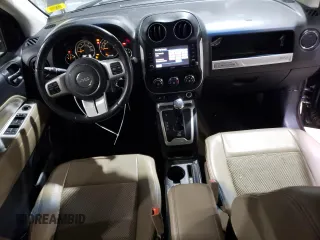 2014 Jeep Compass Latitude with VIN 1C4NJDEB3ED623018, listed as a Copart auction lot 69662954 with 121,115 mi miles and Salvage Title. Bid and sale history available at carsss.com. Image 8.