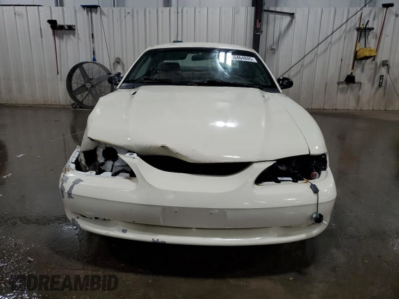 1996 Ford Mustang with VIN 1FALP4045TF168100, listed as a Copart auction lot 60464845 with 116,702 mi miles and Salvage title. Bid and sale history available at DreamBid. Image 5.