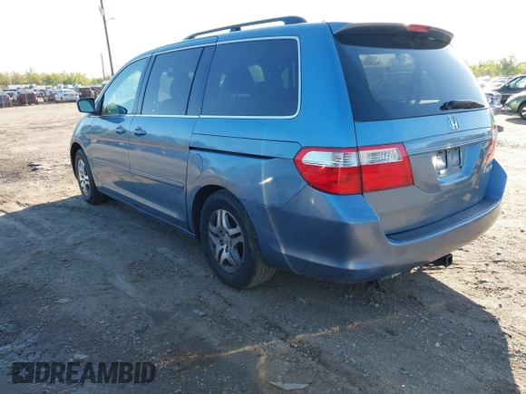 2005 Honda Odyssey EX-L with VIN 5FNRL38605B037065, listed as a IAAI auction lot 42042666 with 228,908 mi miles. Bid and sale history available at carsss.com. Image 3.